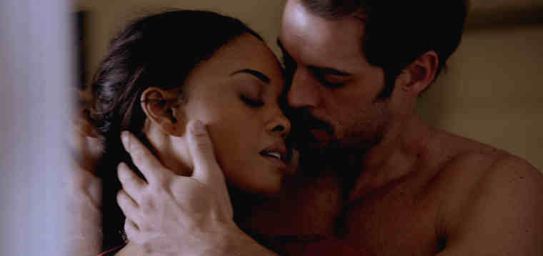 Zoe Reynard (Sharon Leal) and Quinton Canosa (William Levy) in ADDICTED