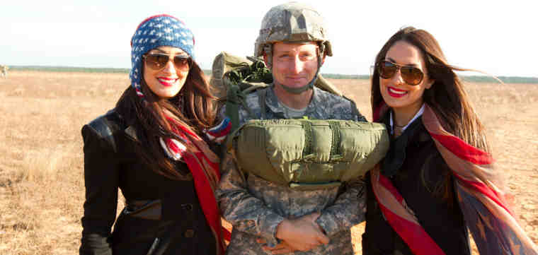WWE Divas The Bella Twins spending time with servicemen and women during Tribute to the Troops