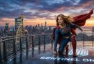 Milly Alcock as a defiant, short-haired Supergirl wearing a battle-worn suit beneath a rugged, unbuttoned trench coat, standing on a dusty alien desert landscape beneath a deep twilight sky.